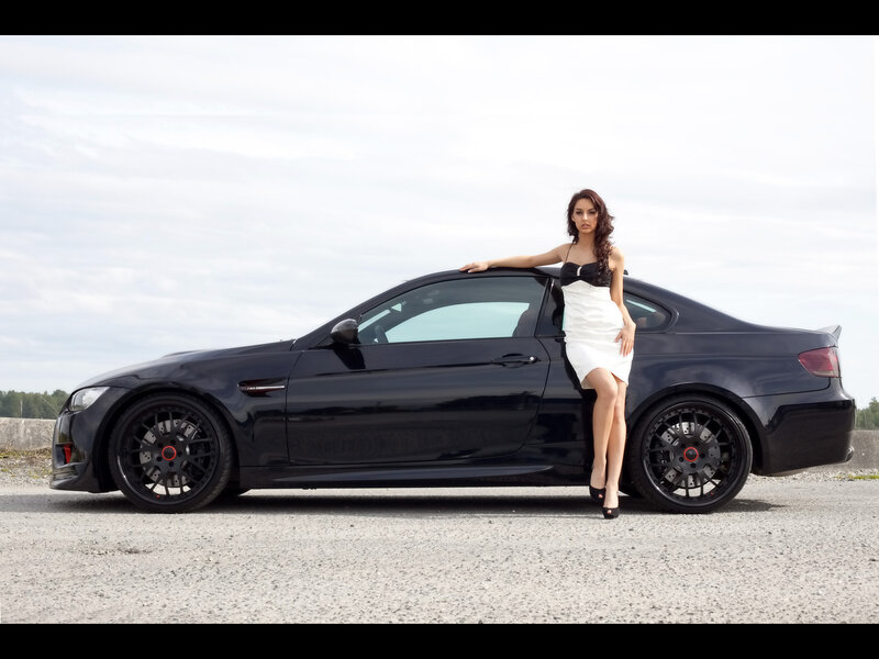 Woman Leaning on Black Car — Confident