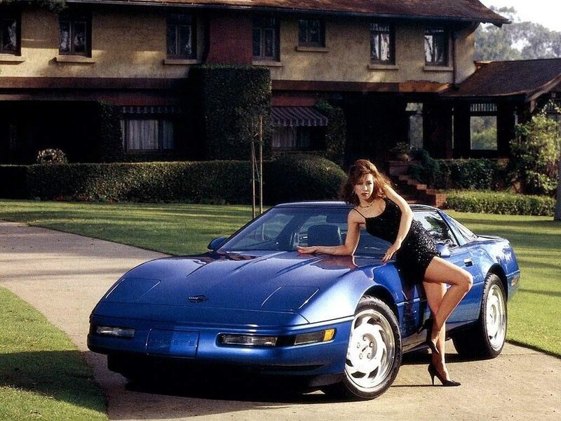 Woman Leaning on Blue Car — Calm, Afternoon