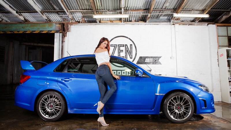 Woman Leaning on Blue Car — Dramatic, Photograph, Garage