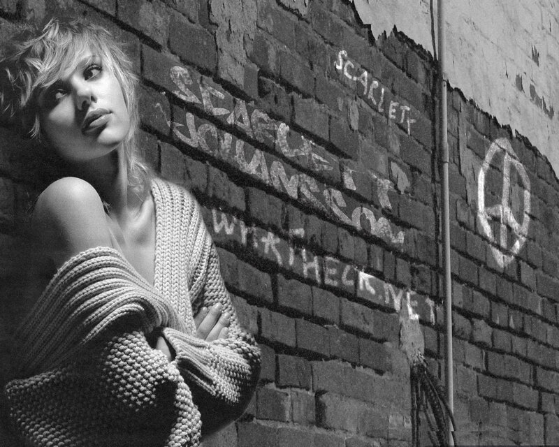 Woman Leaning on Brick Wall — Black