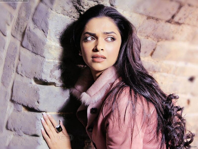 Woman Leaning on Brick Wall — Pink