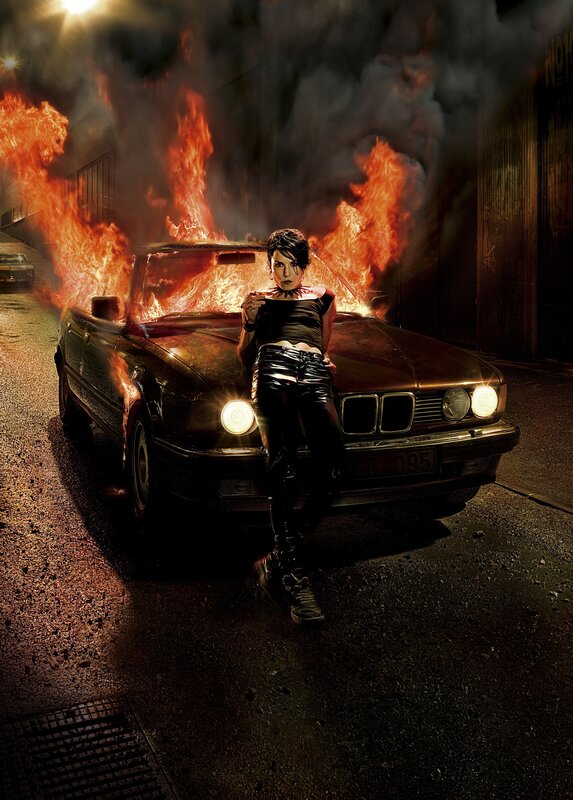Woman Leaning on Burning Car — Black