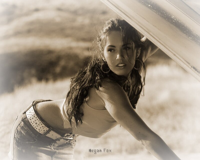 woman leaning on car