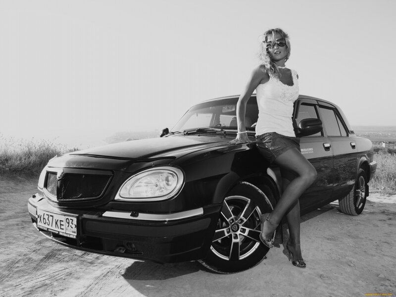Woman Leaning on Car — Black, Confident, Afternoon, Photograph, Sunglasses, High Heels