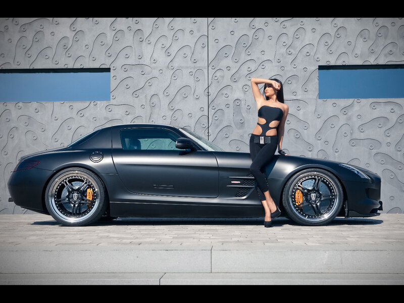 Woman Leaning on Car — Black, Dramatic, Afternoon