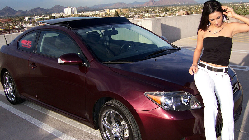 Woman Leaning on Car — Maroon