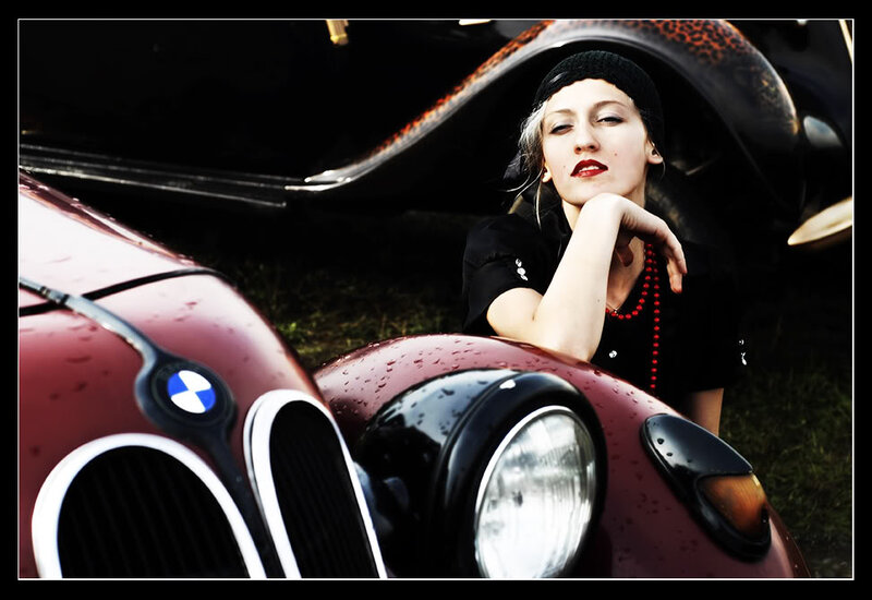 Woman Leaning on Car — Red, Dramatic