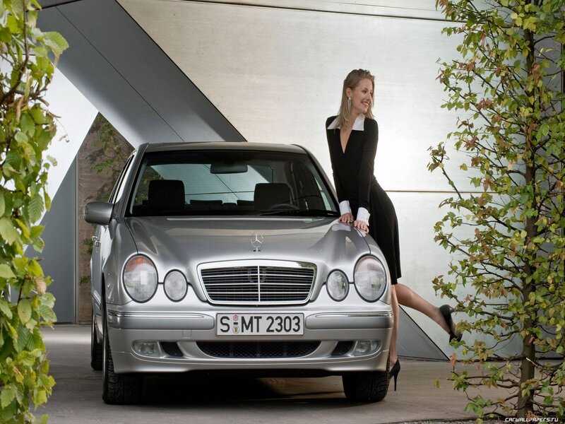 Woman Leaning on Car — Silver, Calm