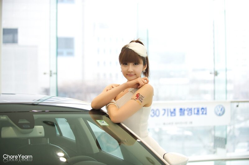 Woman Leaning on Car — White, Calm, Afternoon, Photograph