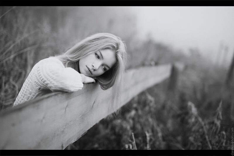 Woman Leaning on Fence — Black