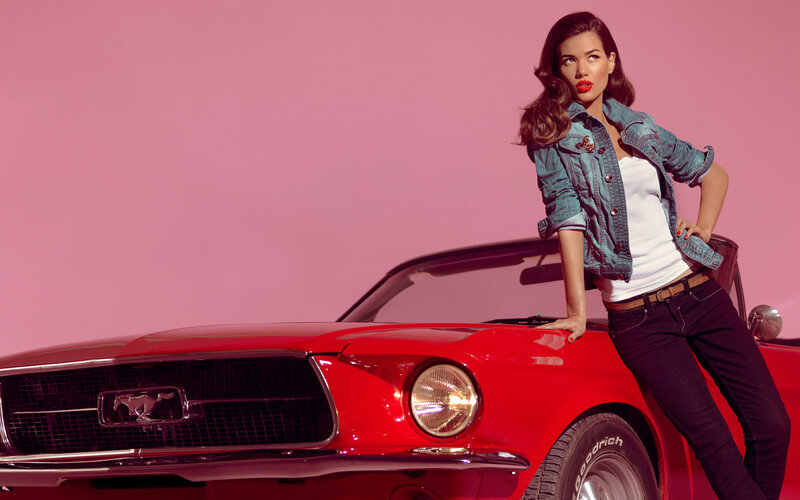 Woman Leaning on Red Car — Confident