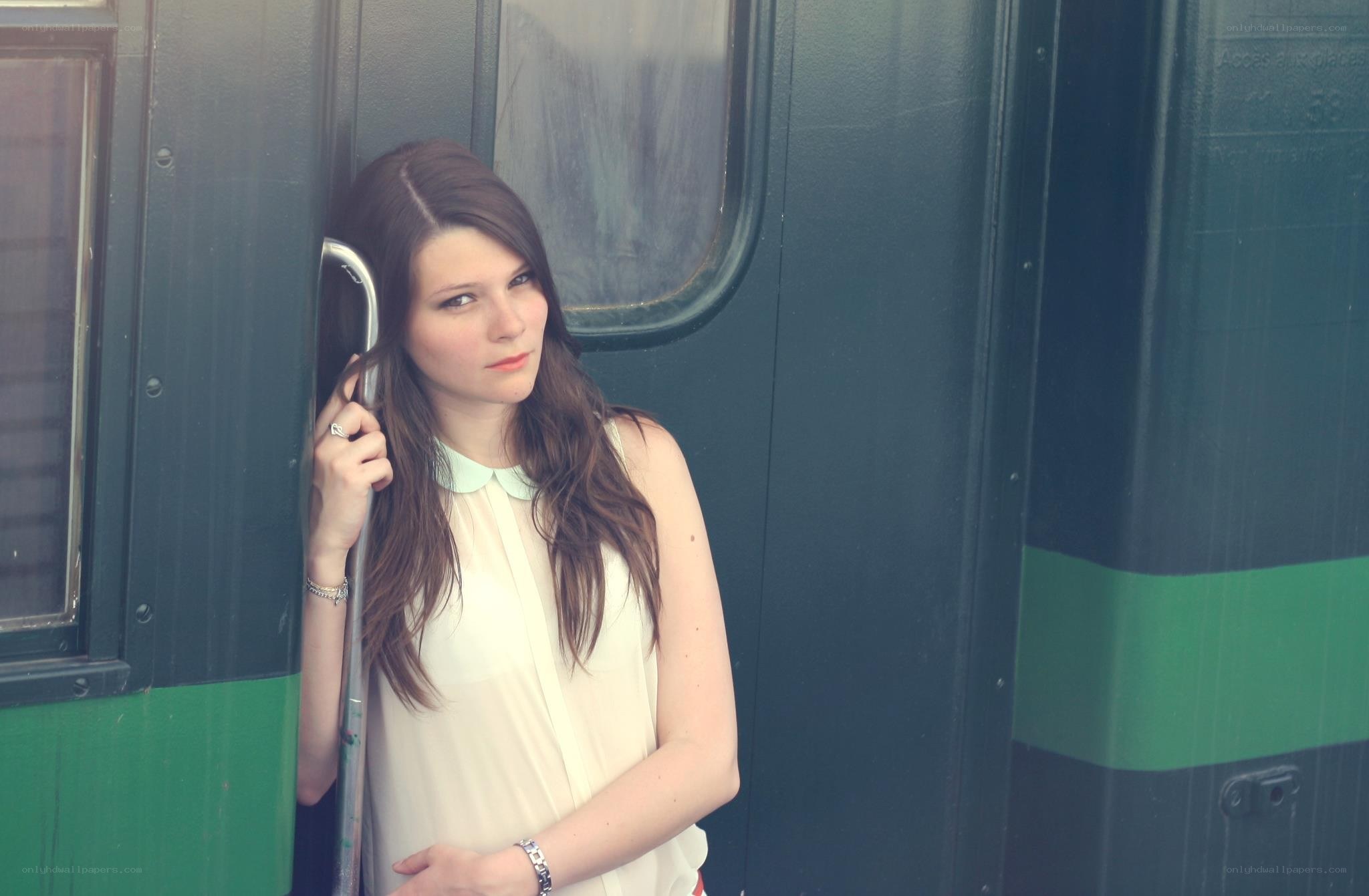 woman leaning on train