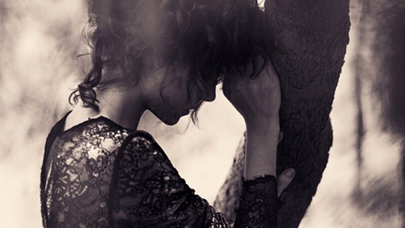 Woman Leaning on Tree — Black, Somber