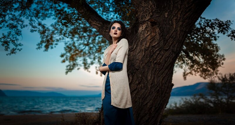 Woman Leaning on Tree — Blue, Dramatic