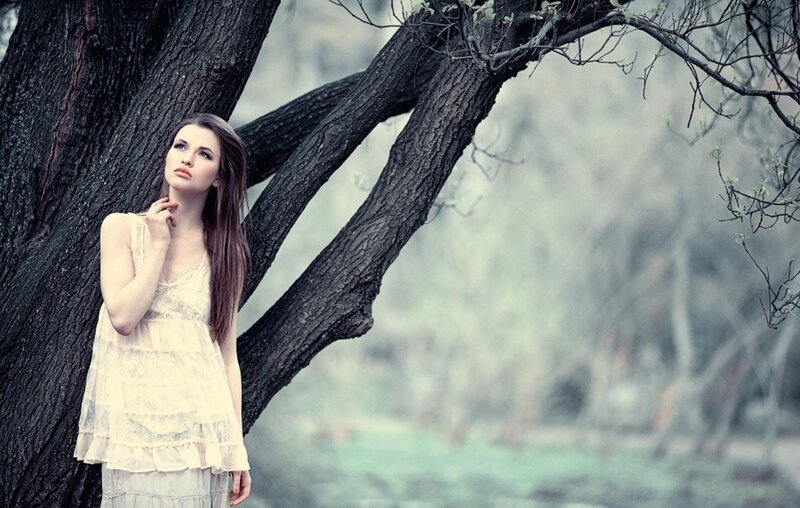 Woman Leaning on Tree — White, Serene, Spring