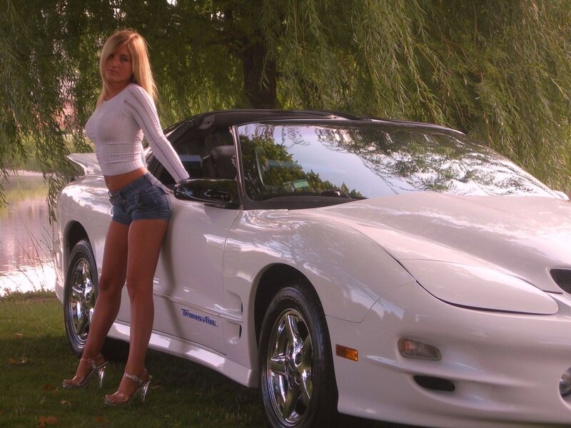 Woman Leaning on White Car — Calm
