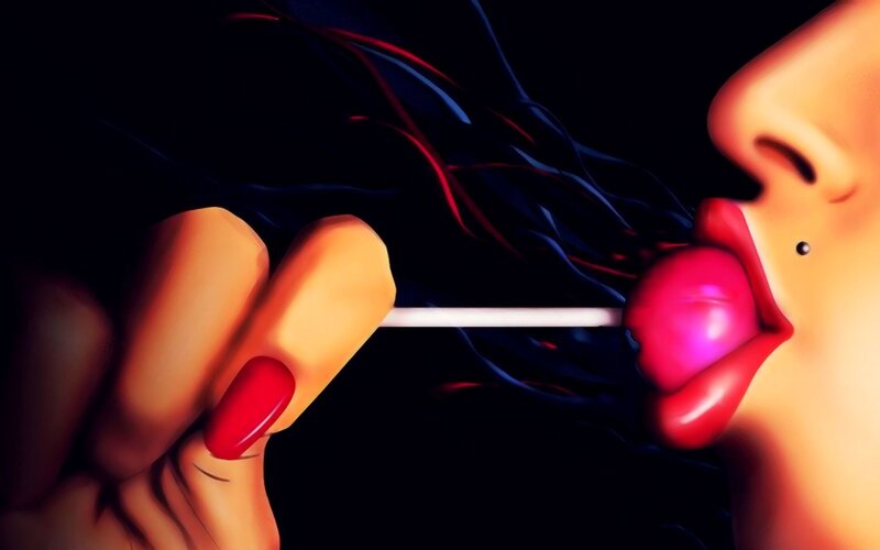 woman licking a lollipop