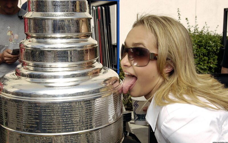 woman licking stanley cup