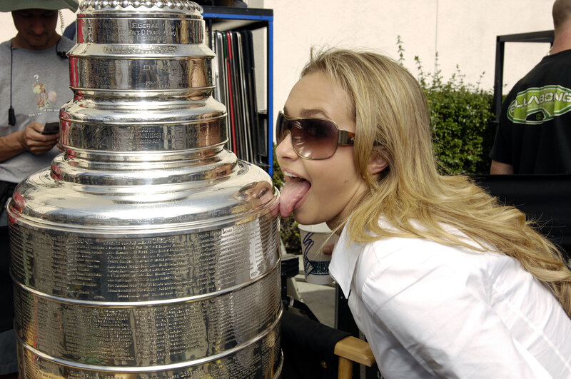 Woman licking Stanley Cup