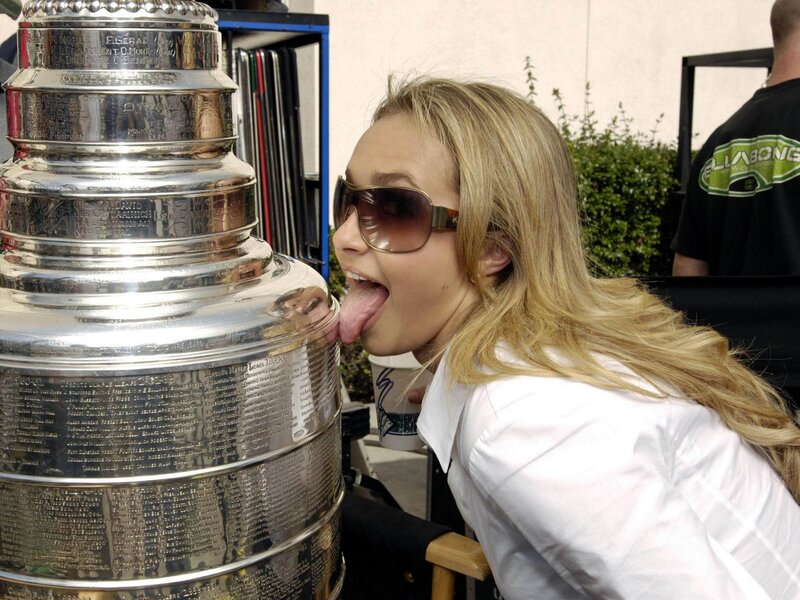 Woman licking Stanley Cup