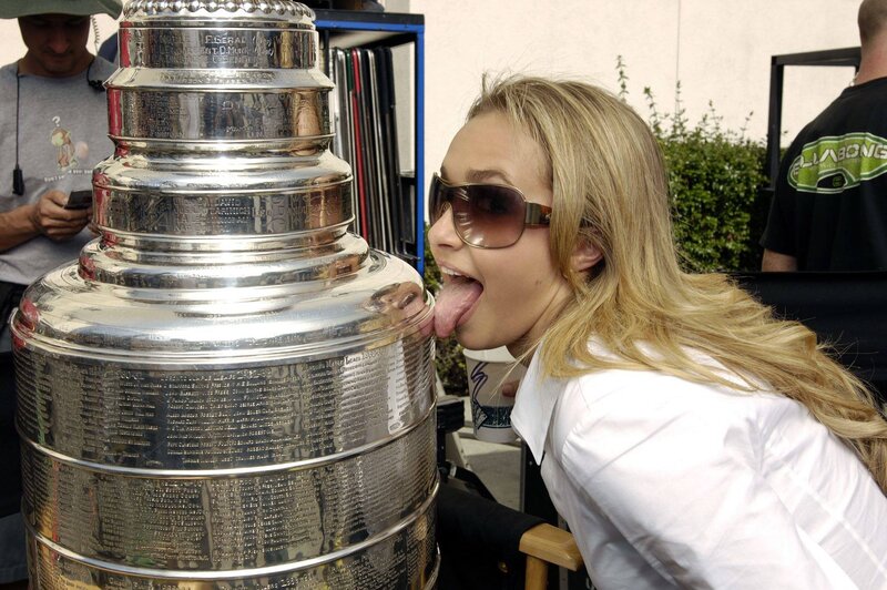 Woman licking Stanley Cup