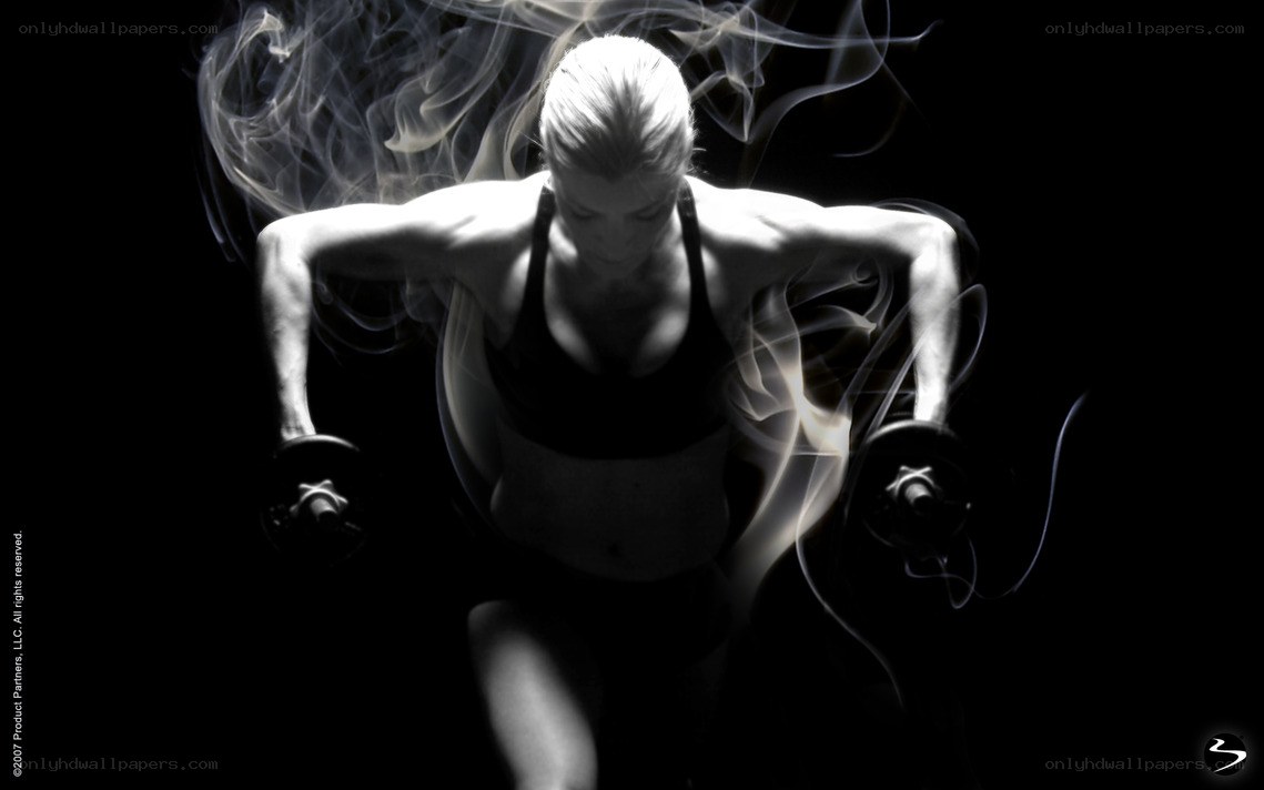 woman lifting weights with smoke