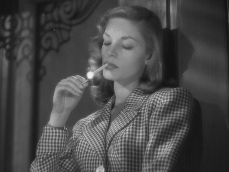 Woman Lighting a Cigarette — Black