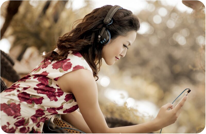 woman listening to music outdoors