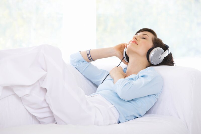 Woman Listening to Music — White, Relaxed, Morning
