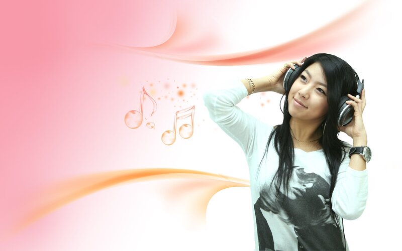 woman listening to music with headphones