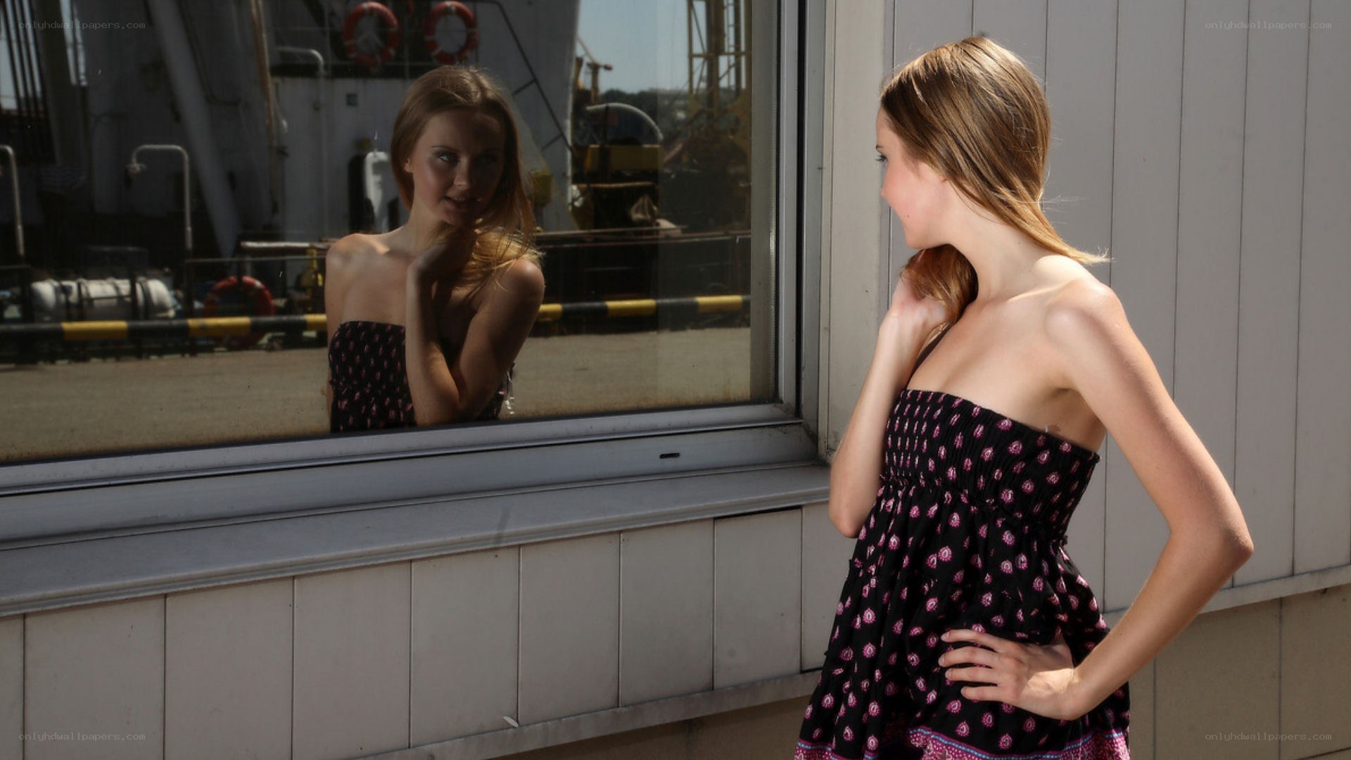Woman looking at her reflection