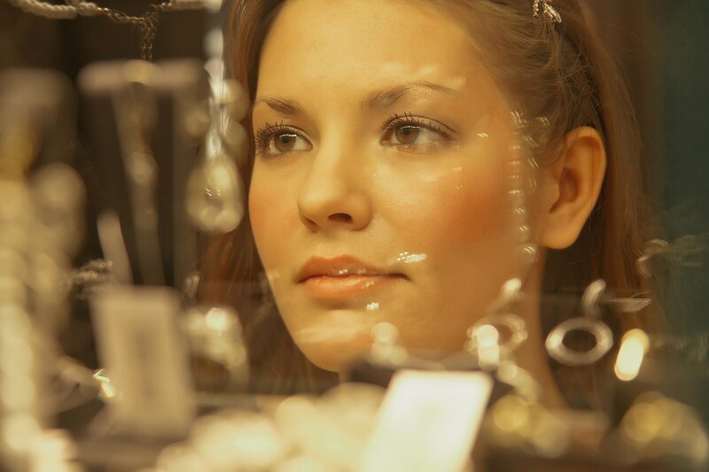 woman looking at jewelry display