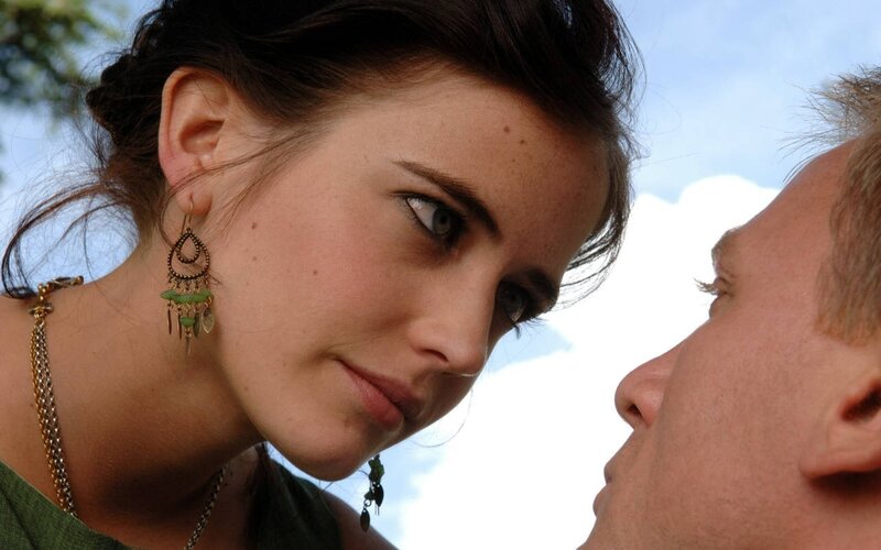 woman looking at man closely