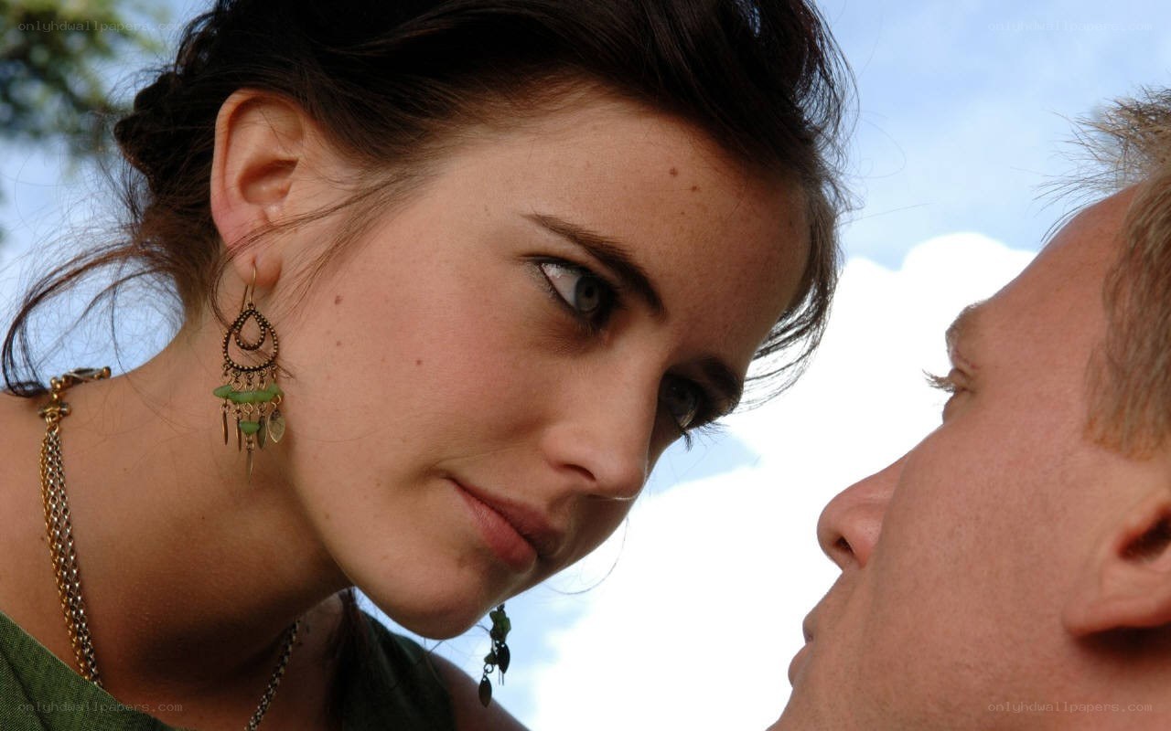 woman looking at man closely