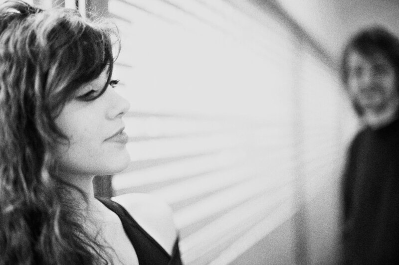 woman looking at man in black and white