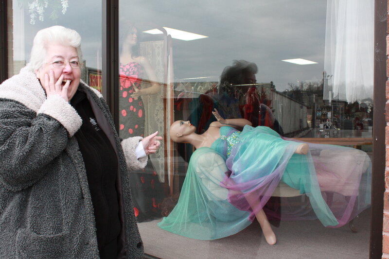 Woman Looking at Mannequin