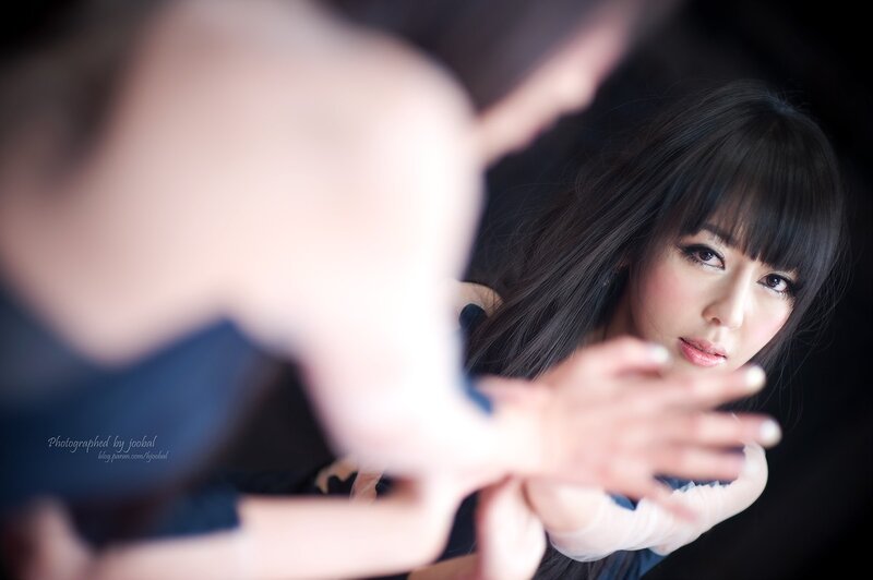 woman looking at reflection