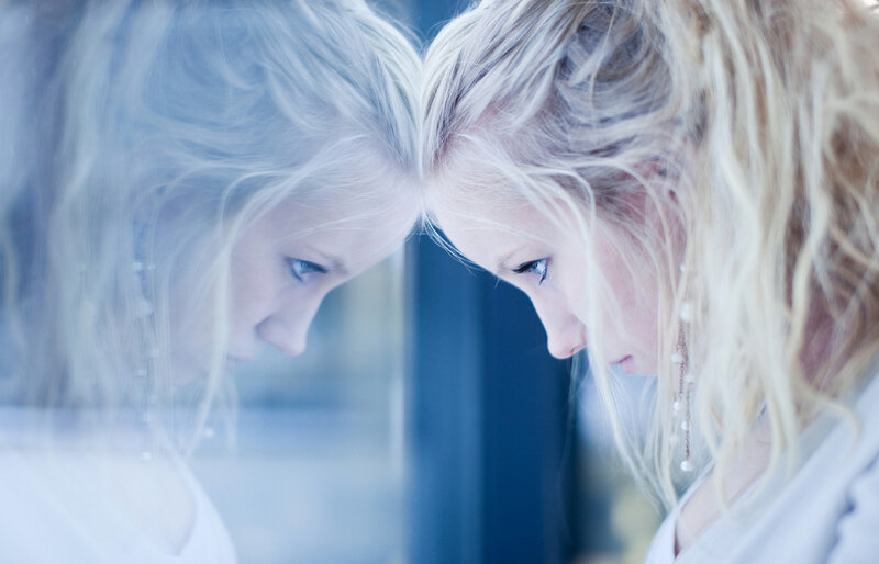 Woman Looking at Reflection — Blue
