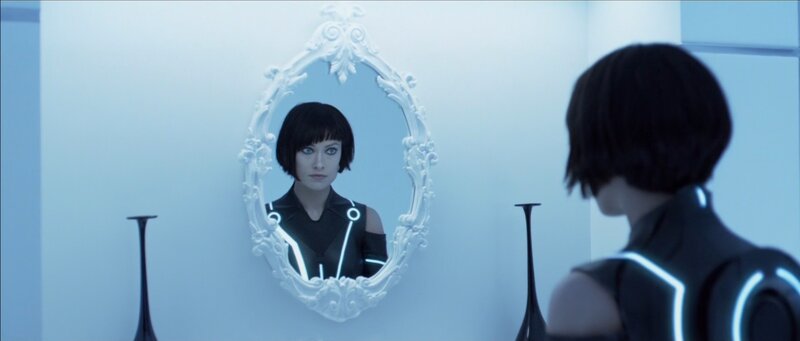 woman looking in mirror