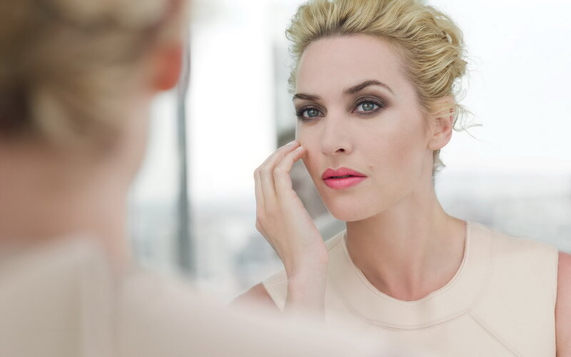 Woman Looking in Mirror — Beige