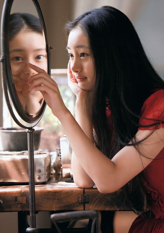 Woman Looking in Mirror — Black, Contemplative, Afternoon