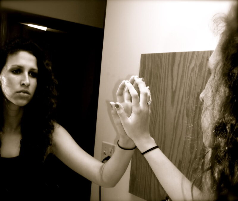 Woman Looking in Mirror — Black, Contemplative, Photograph