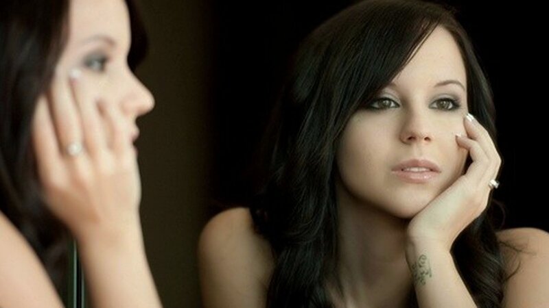 Woman Looking in Mirror — Black, Contemplative