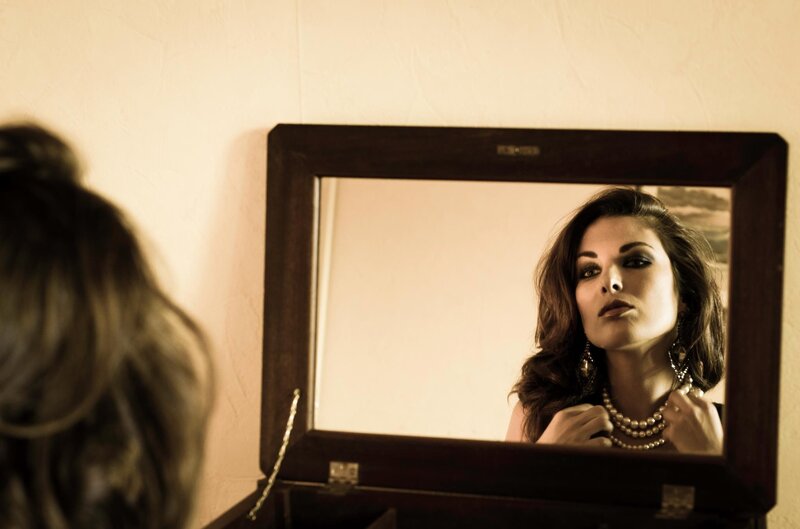 Woman Looking in Mirror — Brown, Dramatic, Photograph, Jewelry