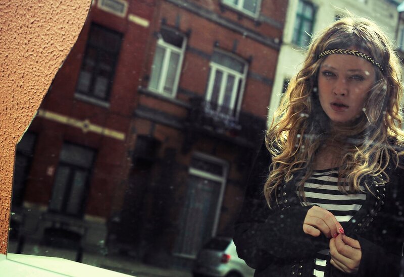 woman looking out window