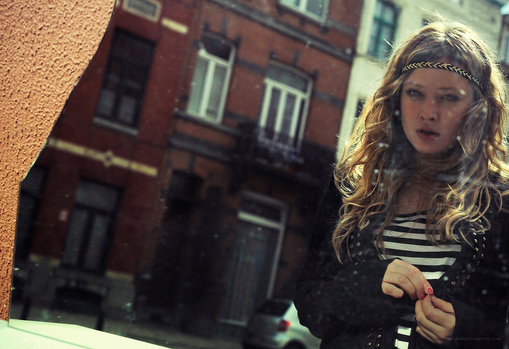 woman looking out window