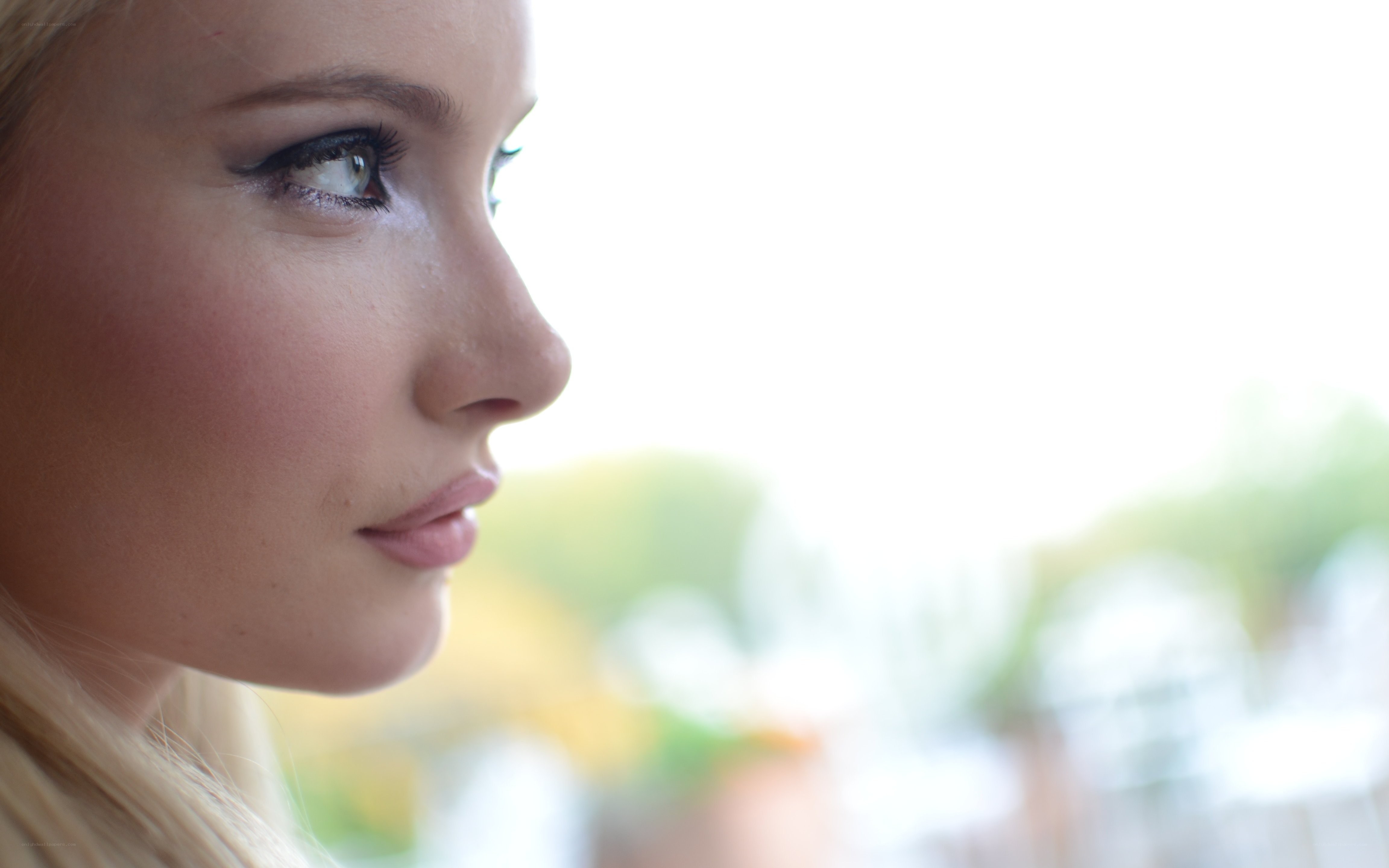 woman looking out window