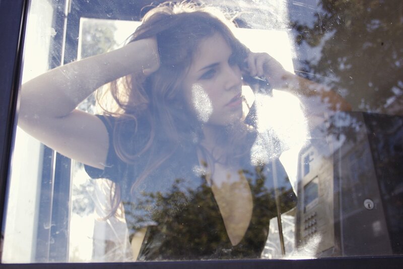 woman looking out window