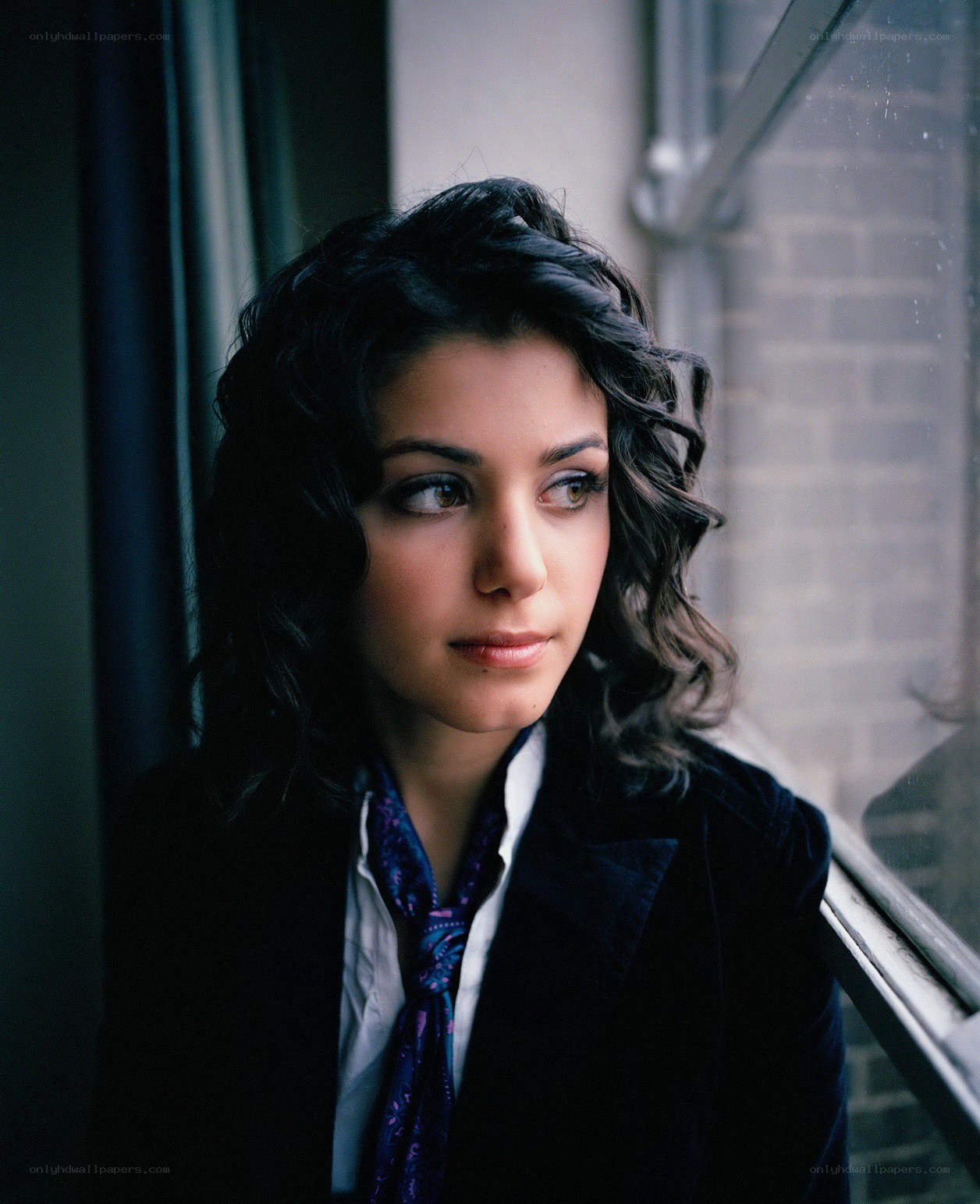 woman looking out window