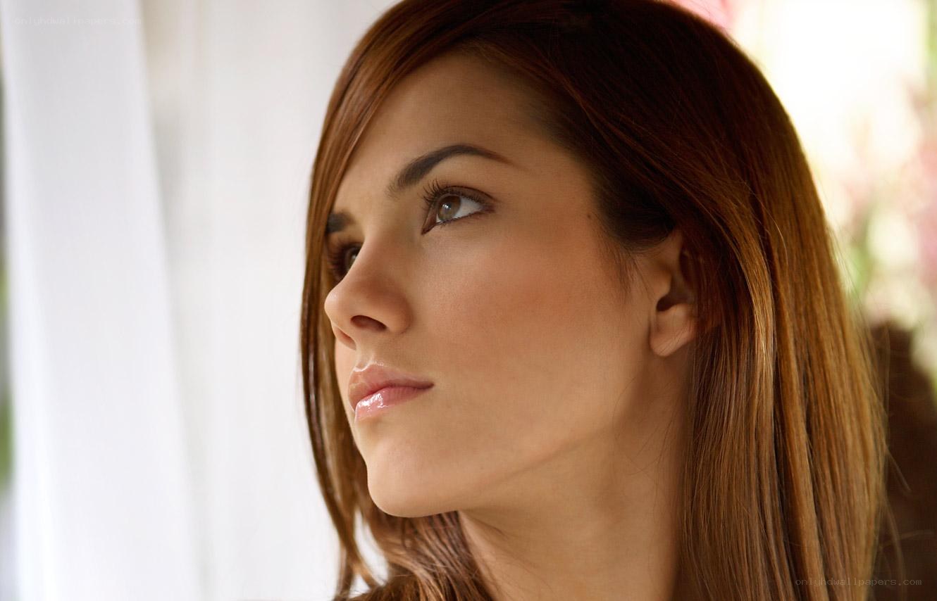 woman looking out window